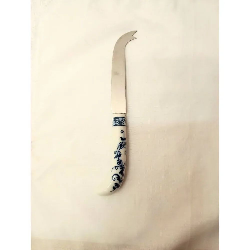 Vintage Lord & Taylor flatware piece ceramic handled cheese knife. Blue and whit